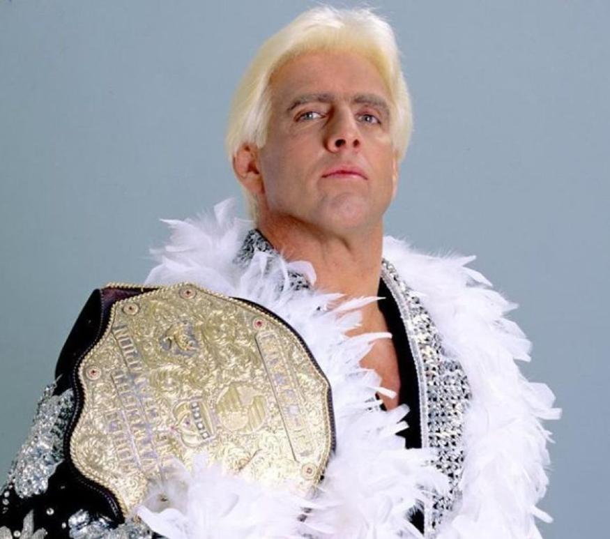 Wrestler Ric Flai with his championship belt